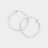 Women's 1.25 Inch Textured Metal Hoop Clip On Earrings