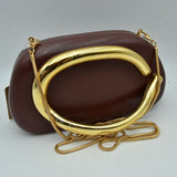 Hard Shell Clutch with Metallic Handle and Chain Strap