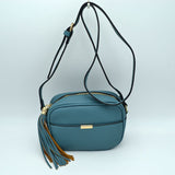 Pebbled Camera Crossbody Bag with Large Statement Tassel Accent