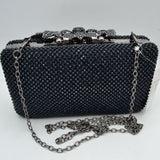 Studded Evening Clutch with Ornate Leaf Clasp Detail