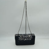 Studded Evening Clutch with Ornate Leaf Clasp Detail