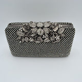 Studded Evening Clutch with Ornate Leaf Clasp Detail
