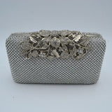 Studded Evening Clutch with Ornate Leaf Clasp Detail