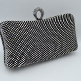 Shimmering Studded Clutch Bag with Textured O-Ring Clasp