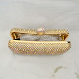 Shimmering Studded Clutch Bag with Textured O-Ring Clasp