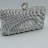 Shimmering Studded Clutch Bag with Textured O-Ring Clasp