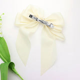 Oversized Pearl Dangle Pointed Bow Barrette
