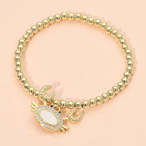 Women's Stainless Steel Mother of Pearl CZ Stone Paved Crab Charm Beaded Stretch Bracelet