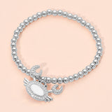 Women's Stainless Steel Mother of Pearl CZ Stone Paved Crab Charm Beaded Stretch Bracelet