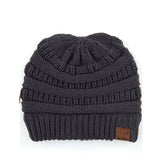 C.C CRISS CROSS PONYTAIL KNIT BEANIE