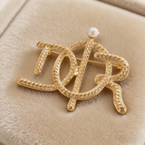 Vintage D Letter Twist Brooch
