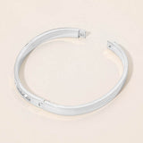 Stainless Steel CZ Accent Quatrefoil Engraved Hinged Bangle Bracelet