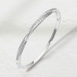 Rhodium Plated CZ Pave Twist Hinged Bangle Bracelet