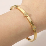 Stainless Steel CZ Center Quatrefoil Station Hinged Bangle Bracelet