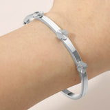 Stainless Steel CZ Center Quatrefoil Station Hinged Bangle Bracelet