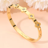 Stainless Steel CZ Stone Accent Quatrefoil Motif Hinged Bangle Bracelet