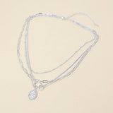 White Gold Dipped Oval Sunburst Charm Accent Mixed Chain Layered Necklace
