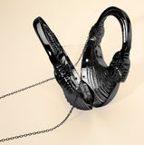 Hard Shell Metallic Sculpted Loop Top Handle Handbag