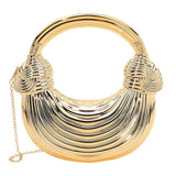 Hard Shell Metallic Sculpted Loop Top Handle Handbag