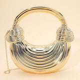 Hard Shell Metallic Sculpted Loop Top Handle Handbag