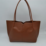 Minimalist Structured Tote Bag with Geometric Cutout and Tassel Accent