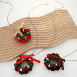 Bow Pom Pom Wreath Long Pendant Necklace