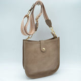 Minimalist Curved Crossbody Bag with Patterned Guitar Strap