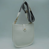 Minimalist Curved Crossbody Bag with Patterned Guitar Strap