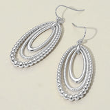 Textured Bead Layered Oval Dangle Earrings