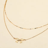Metal Bow Pendant Accent Layered Chain Necklace