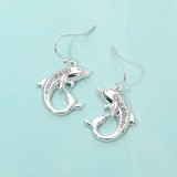 Stone Paved Dolphin Dangle Earrings