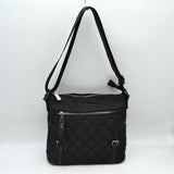 Quilted Nylon Crossbody Bag with Buckle Accents and Tassel Charm
