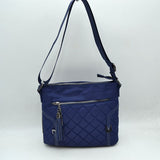 Quilted Nylon Crossbody Bag with Buckle Accents and Tassel Charm