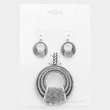 Embossed metal pendant set