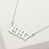 White Gold Dipped 1997 Birth Year Plate Pendant Necklace