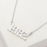 White Gold Dipped 1982 Birth Year Plate Pendant Necklace