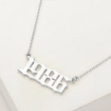 White Gold Dipped 1986 Birth Year Plate Pendant Necklace
