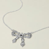 Stone Accent Antique Metal Vintage Bow Pendant Necklace