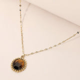 Stainless Steel Beaded Trim Oval Stone Pendant Necklace