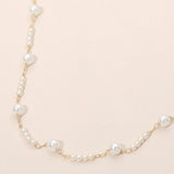 Elegant Graduated Pearl Station Necklace