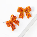 Pave bow stud earrings